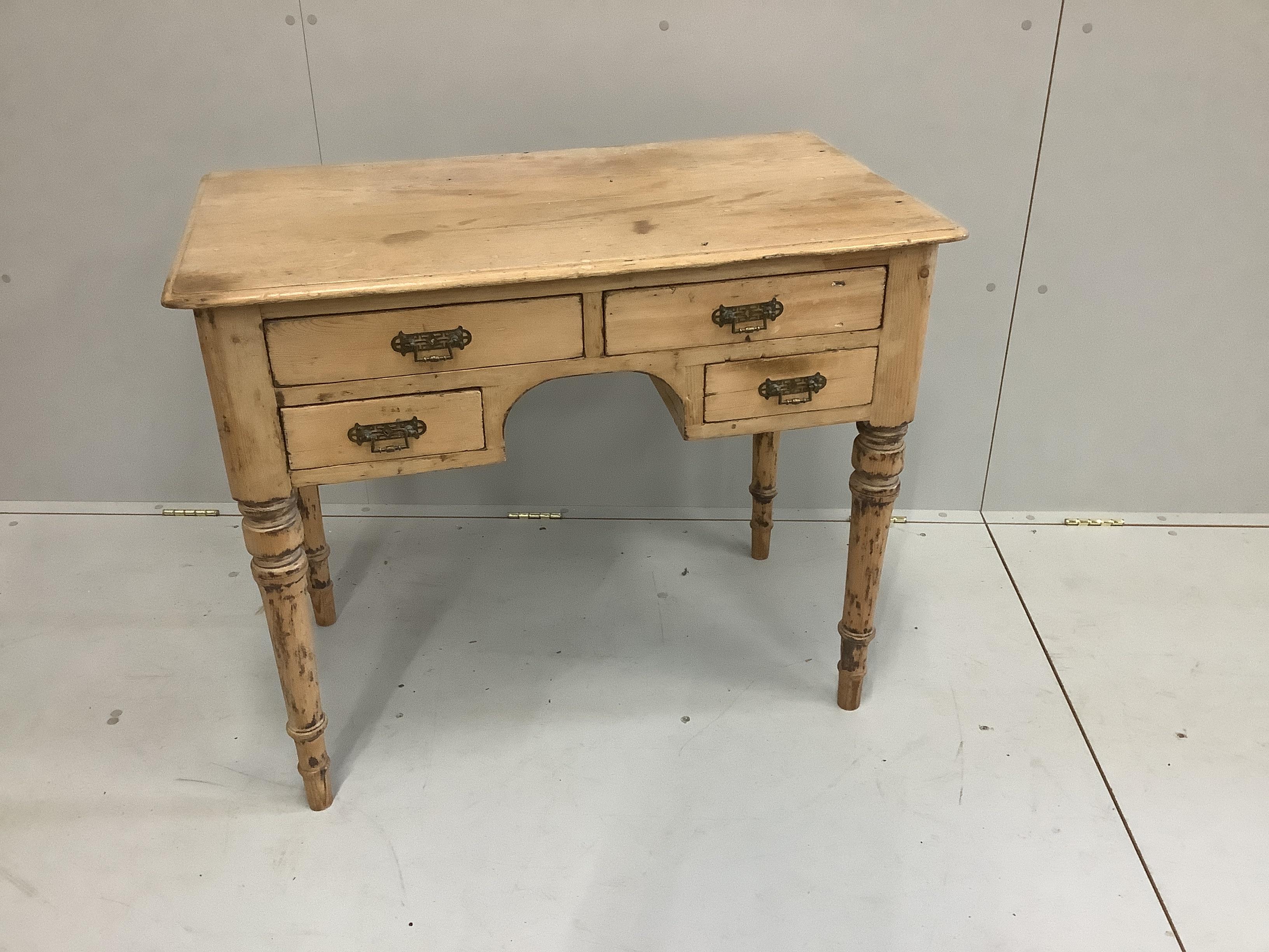 A Victorian pine kneehole side table fitted with four drawers, width 91cm, depth 52cm, height 76cm